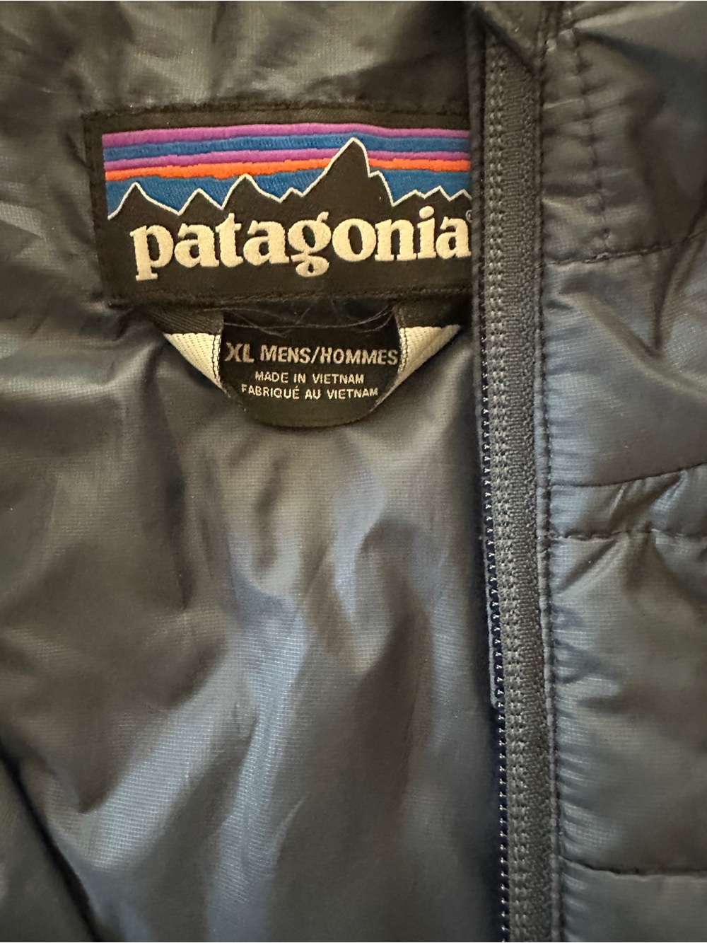Patagonia Quilted Vest in Dark Navy with Multicolor Logo